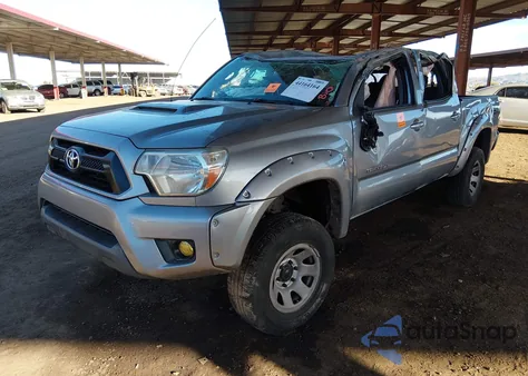 2015 Toyota Tacoma Base V6 z USA, uszkodzony, nr VIN 3TMLU4ENXFM194684